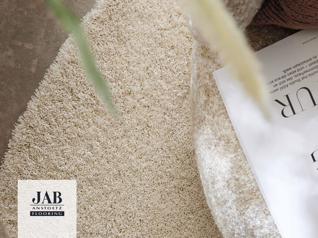 Detailaufnahme Creme-farbiger Teppich