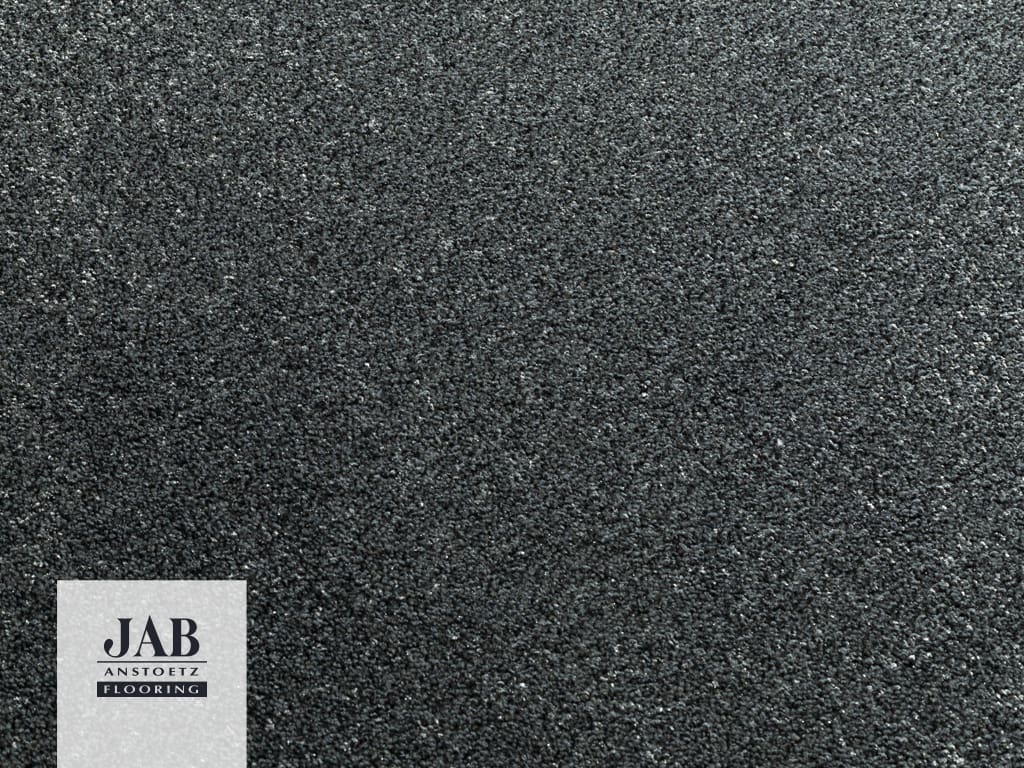 Detailbild vom Teppichboden in dunkel Grau