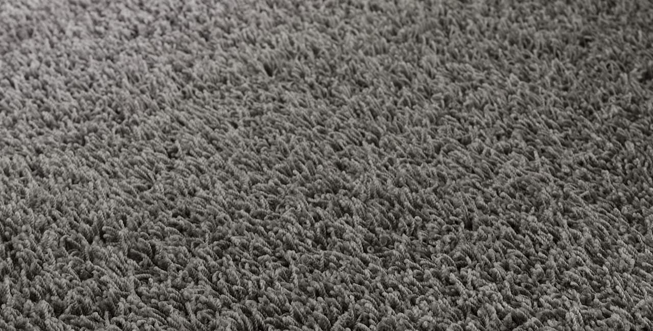 Grauer Teppich Detailbild
