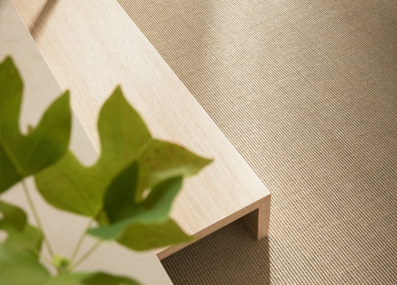 Beigefarbiger Teppich Detail